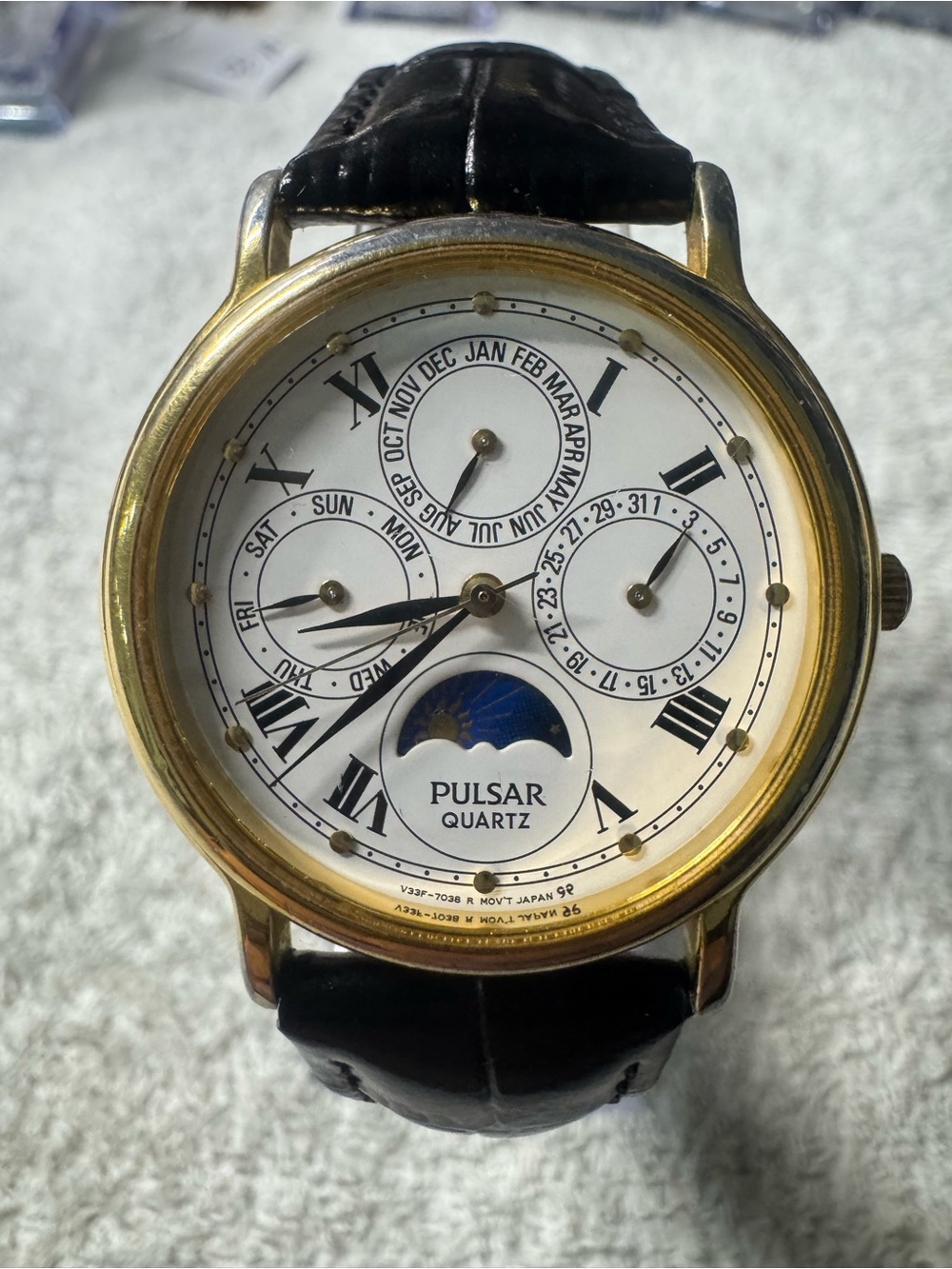 Pulsar Gold-Tone Case White Dial Black Leather Strap Moonphase Watch